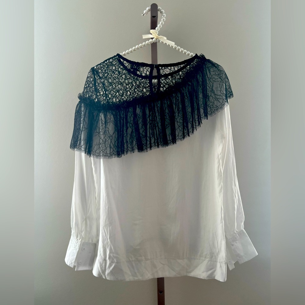 Black lace and white top